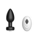Dop anal vibrant negru cu bijuterie la bază și telecomandă wireless albă