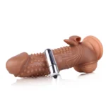 Prelungitor vibrant pentru penis din TPE cu glonțul vibrator introdus în locașul de la bază