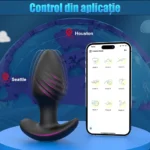 Dopul anal negru pe un suport, lângă un telefon care afișează cele 9 moduri din aplicație